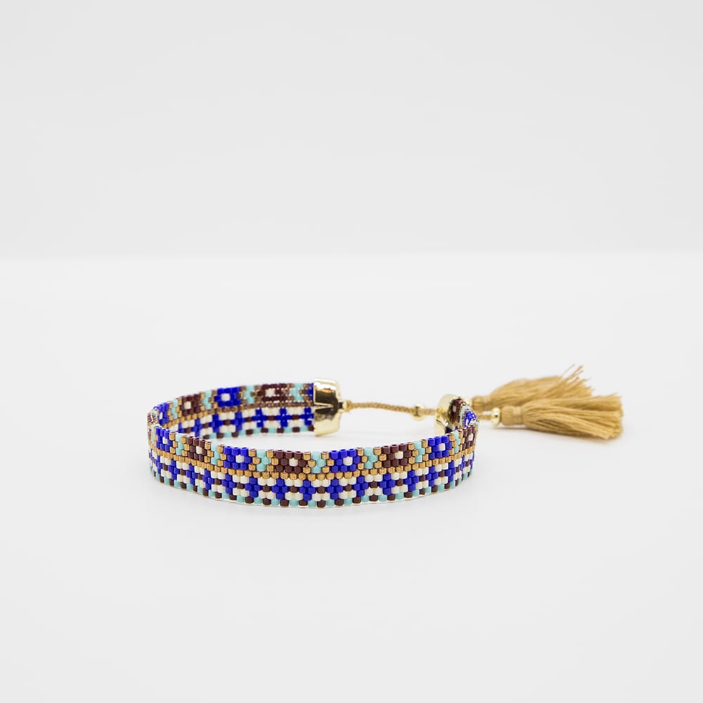 Egyptian bead bracelet with tasselsimage